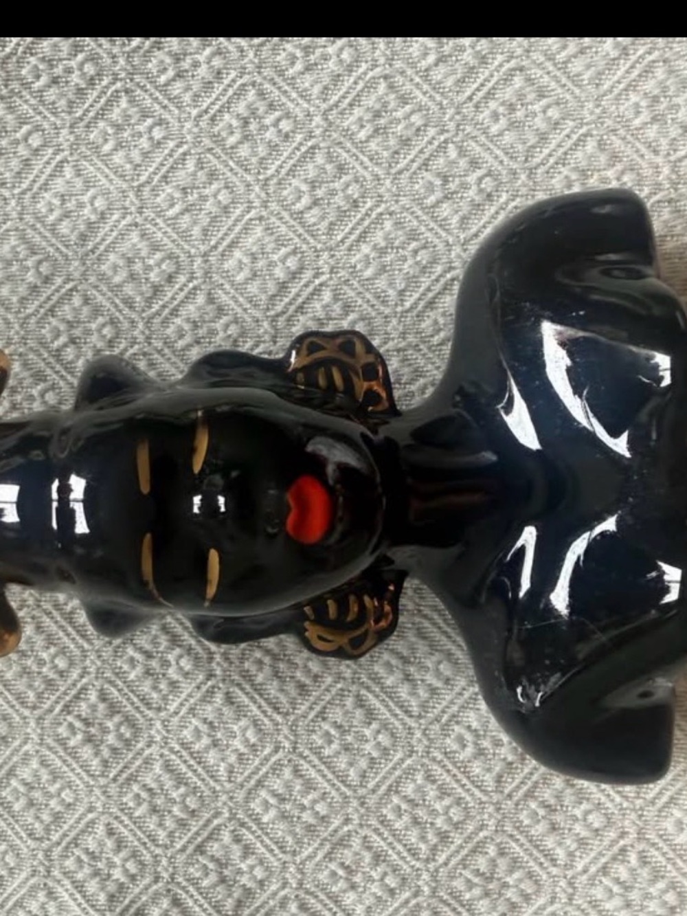 Handcrafted Black Ceramic Figurine with Gold Accents